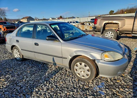 1999 Honda Civic Lx z USA, uszkodzony, nr VIN 2HGEJ6675XH584056